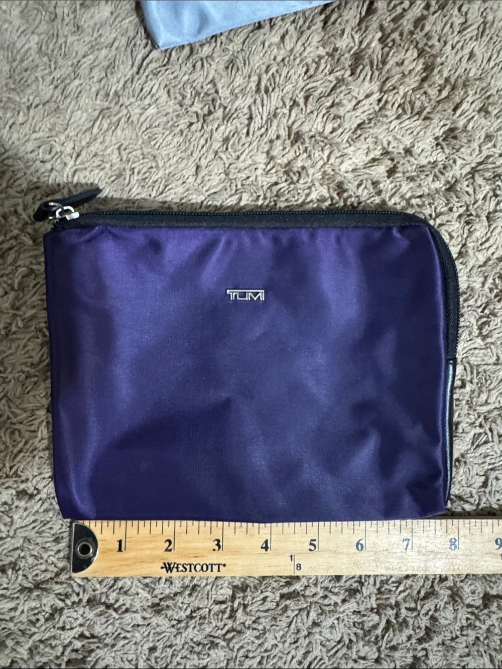 Tumi Four-Piece Travel Pouch Set in Black, Gray, Light Gray & Purple Vacation